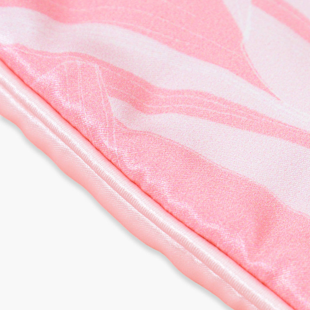 Close-up image of the Elegant Silk Eye Mask - Pink Canyon by SusanSilk, highlighting its luxurious satin trim and exquisite craftsmanship.