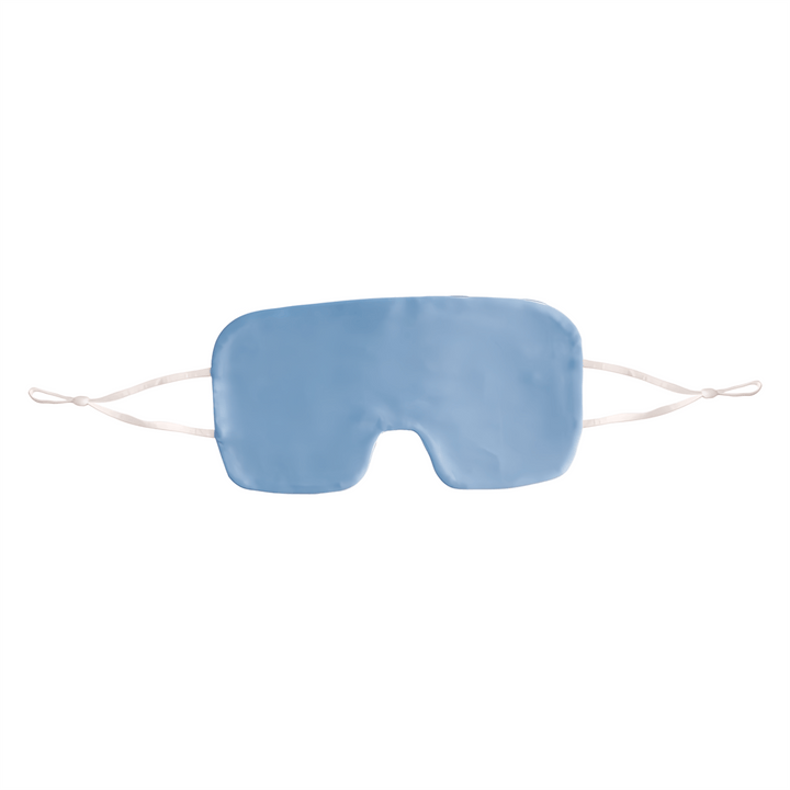 The Oversized Silk Eye Mask by SusanSilk is a luxurious blue eye mask featuring elastic straps on both sides.