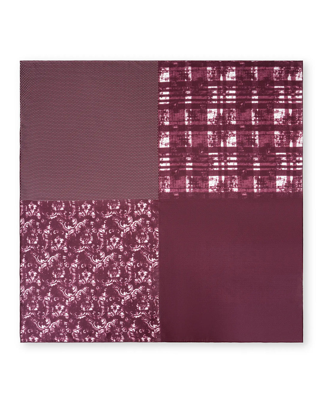 A rectangular quilt with four sections, each featuring a distinctive SusanSilk Straits Red Square Silk Scarf pattern, including polka dots, plaid, floral designs, and solid color.