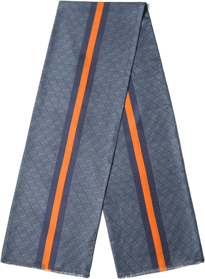 A Luxurious Men's Blue and Yellow Silk Twill Scarf by SusanSilk features an intricate geometric pattern and two parallel orange stripes running along its length.