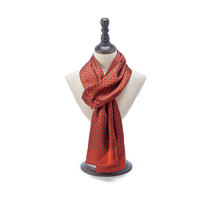 A Geometric Pattern Long Silk Scarf from the SusanSilk collection is displayed on a beige mannequin bust against a white background.