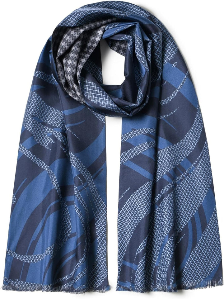 A Dreamy Blue Luxurious Men's Silk Twill Scarf by SusanSilk, featuring a geometric pattern with dark and light blue sections and houndstooth accents.