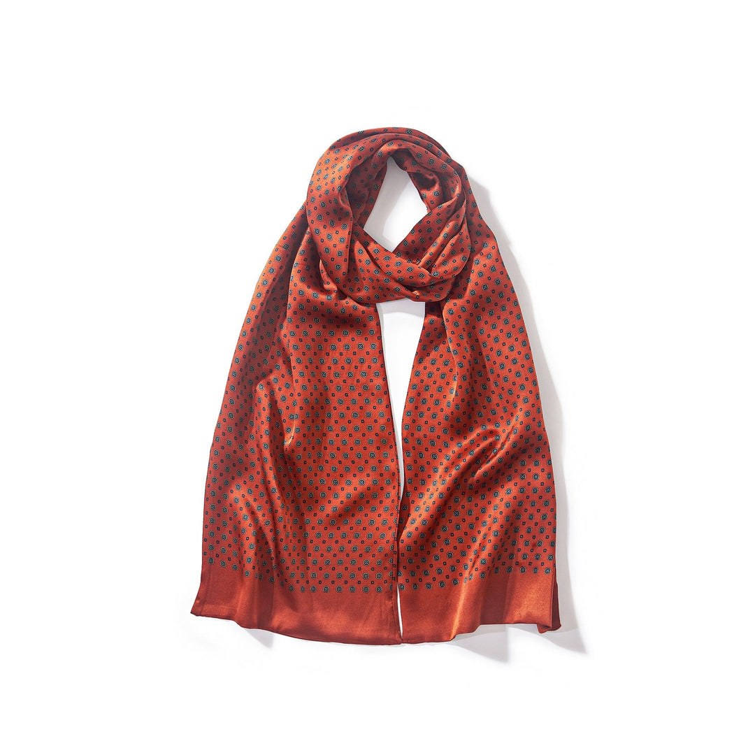 A long Geometric Pattern Silk Scarf in red with small black dots from SusanSilk.