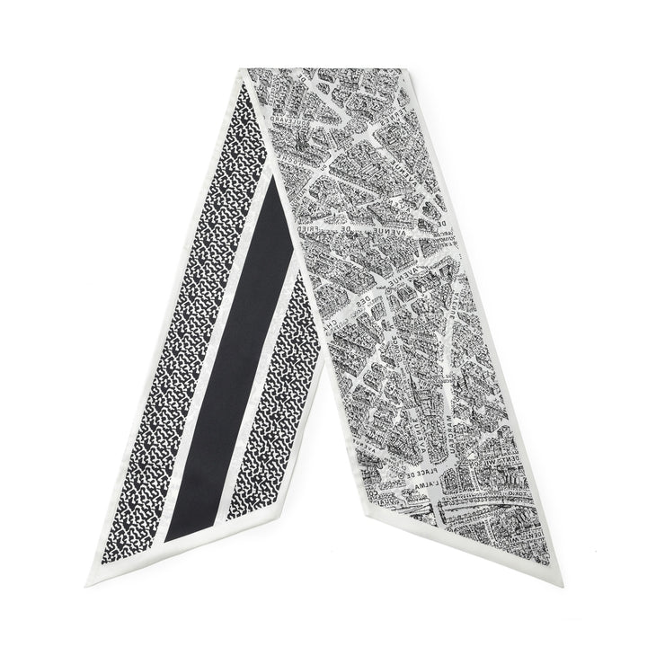 A SusanSilk 16 Momme Affordable Luxury Silk Twill Long Silk Scarf-Black & White City, featuring an intricate city map and geometric patterns, elegantly laid out in a V shape.