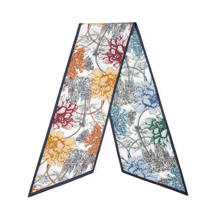 Introducing the SusanSilk 16 Momme Affordable Luxury Silk Twill Long Silk Scarf - Peony Mirage: a sophisticated, long, narrow scarf adorned with a floral pattern featuring orange, blue, green, and red flowers on a white background outlined in black.