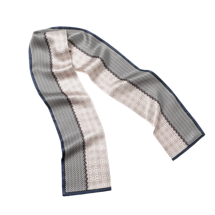 A Korean Style Silk Long Fluttering Belt from SusanSilk, showcasing a geometric design in beige and black, complete with a border.