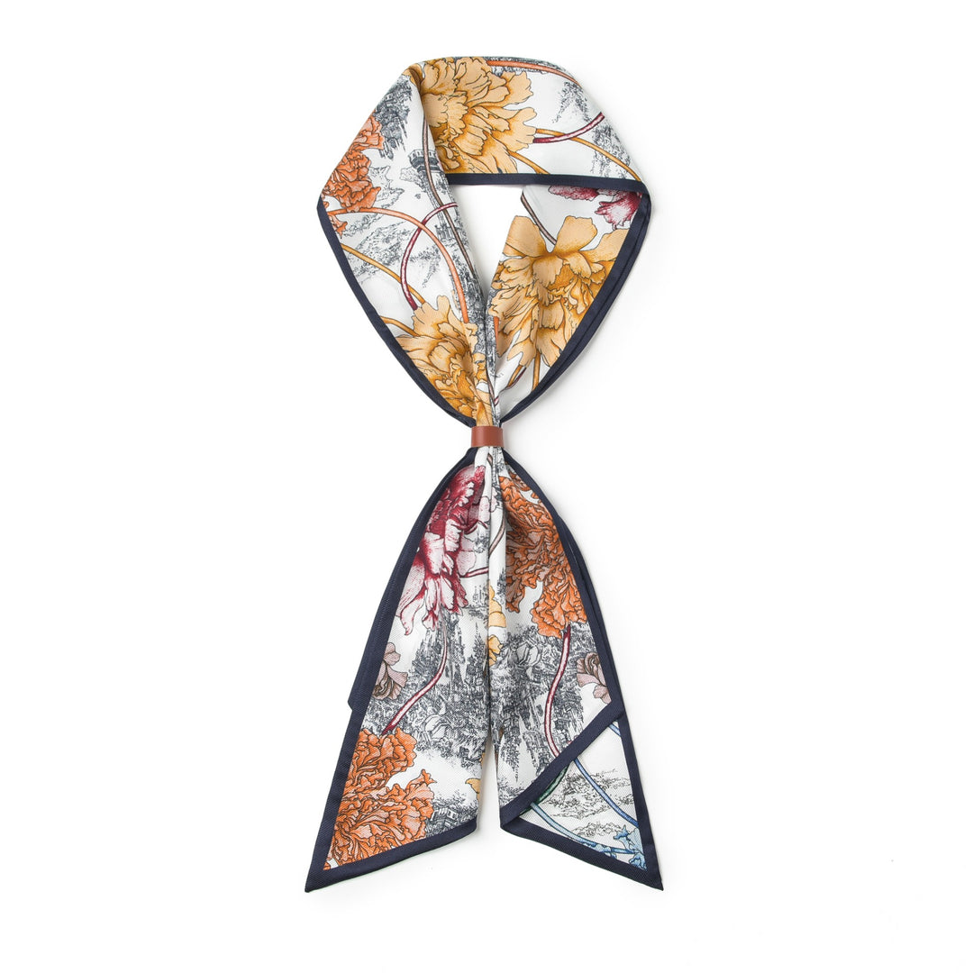 A 16 Momme Affordable Luxury Silk Twill Long Silk Scarf-Peony Mirage featuring a floral pattern in yellow, red, and black hues, tied in a decorative bow from SusanSilk.