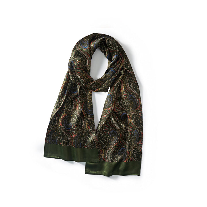 A dark green Paisley Series Long Silk Scarf from SusanSilk, featuring an intricate paisley pattern with red, blue, and gold accents, laid flat against a white background.