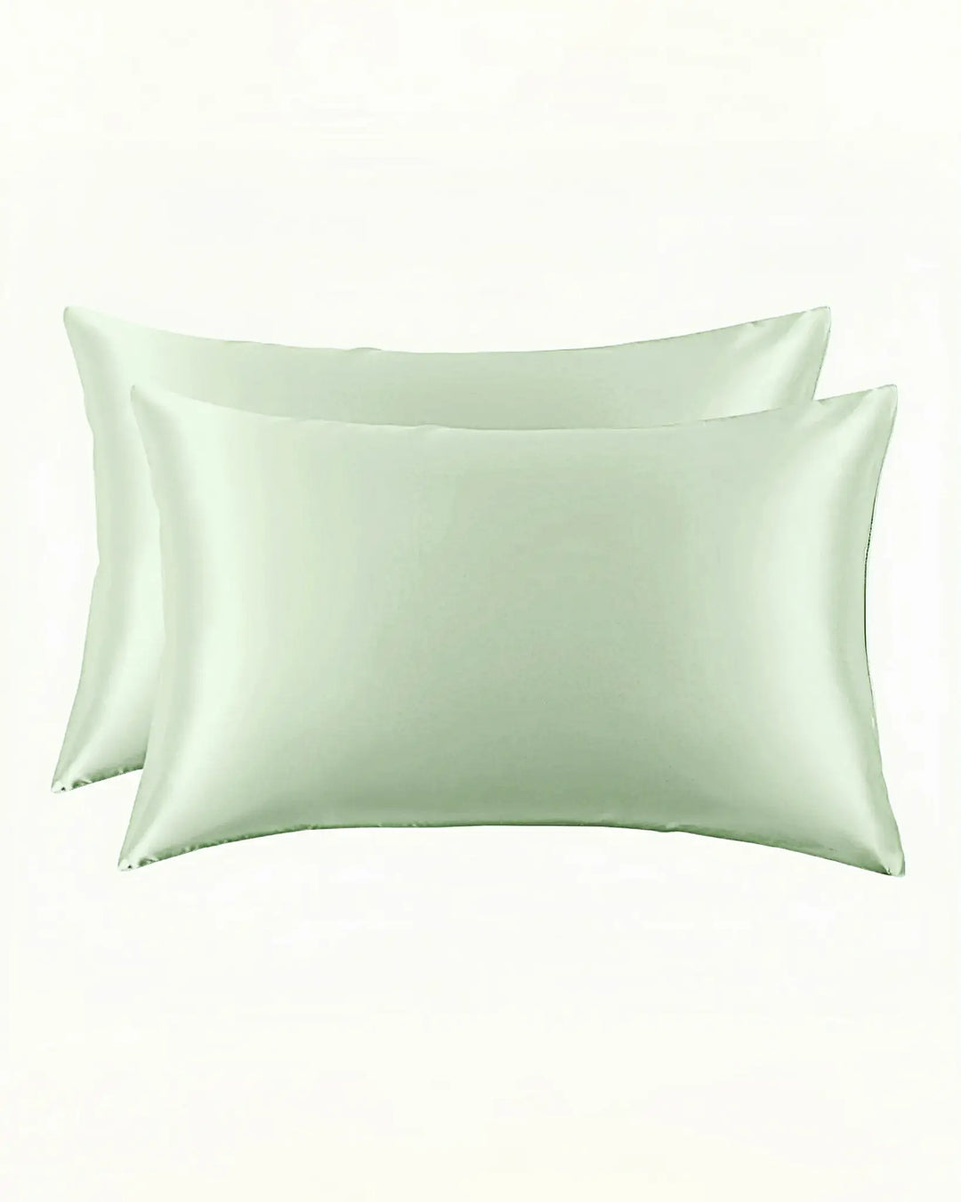 Two New Arrival 25 Momme Beauty Silk Pillowcase Zippers, in light green and crafted from luxurious SusanSilk, are shown side by side against a plain white background.