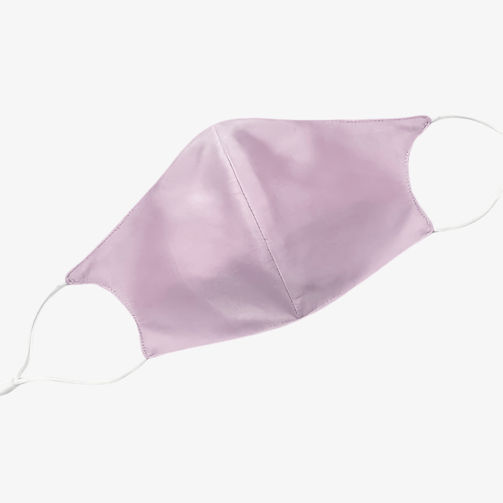 A light purple Double Layer Silk Face Mask with Nose Wire from SusanSilk, featuring white ear loops, is shown against a white background.