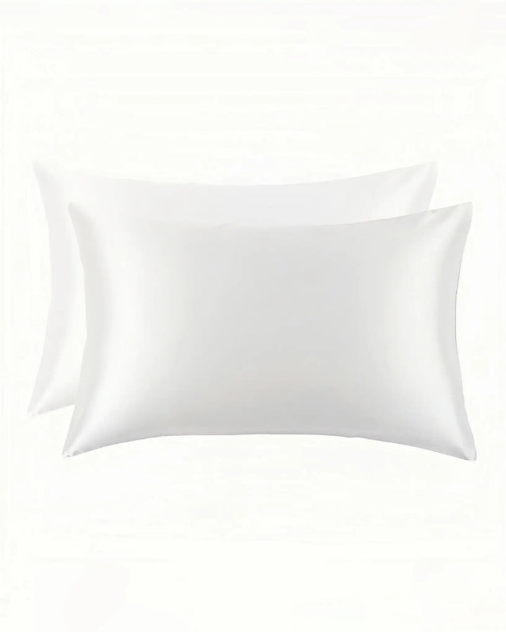 Two pillowcases from SusanSilk, called the New Arrival 25 Momme Beauty Silk Pillowcase Zipper, crafted from luxurious white silk and rectangular in shape, are displayed against a white background.