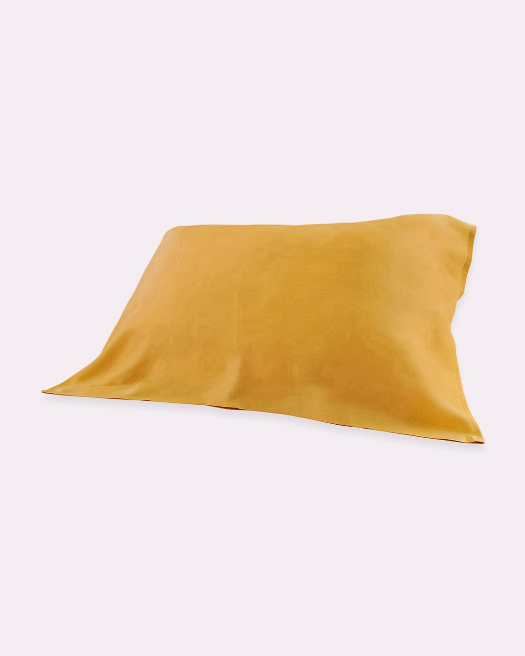 The 19 Momme Baby & Toddler Silk Pillow Cover by SusanSilk, in a vibrant yellow shade, is shown on a white background. Made from 100% silk and featuring eco-friendly reactive printing, it promises natural and cozy sleep.