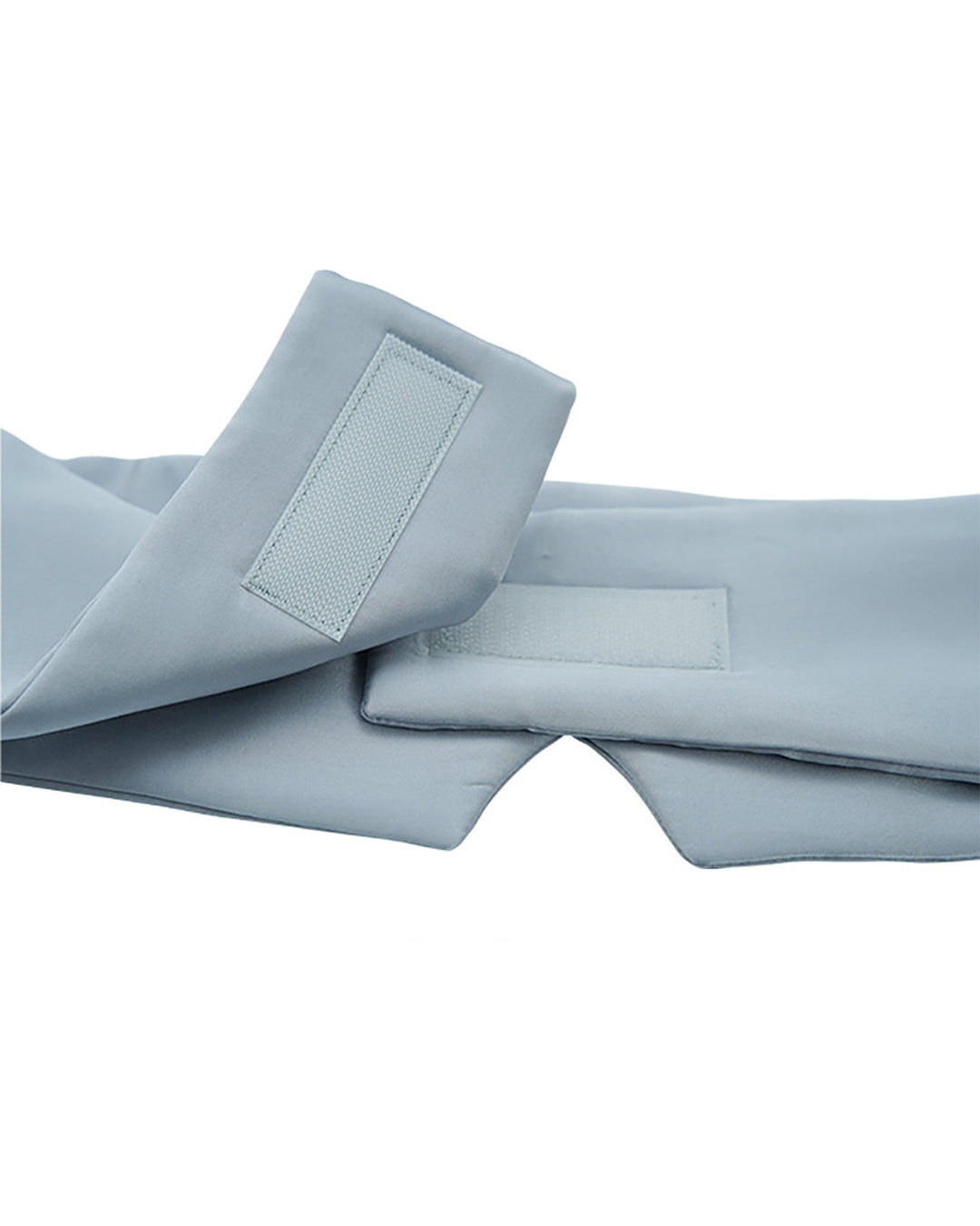 Close-up of the light blue fabric cuffs with Velcro fastenings on the Large One Piece Silk Eye Mask by SusanSilk, exuding a smooth susansilk-like texture.