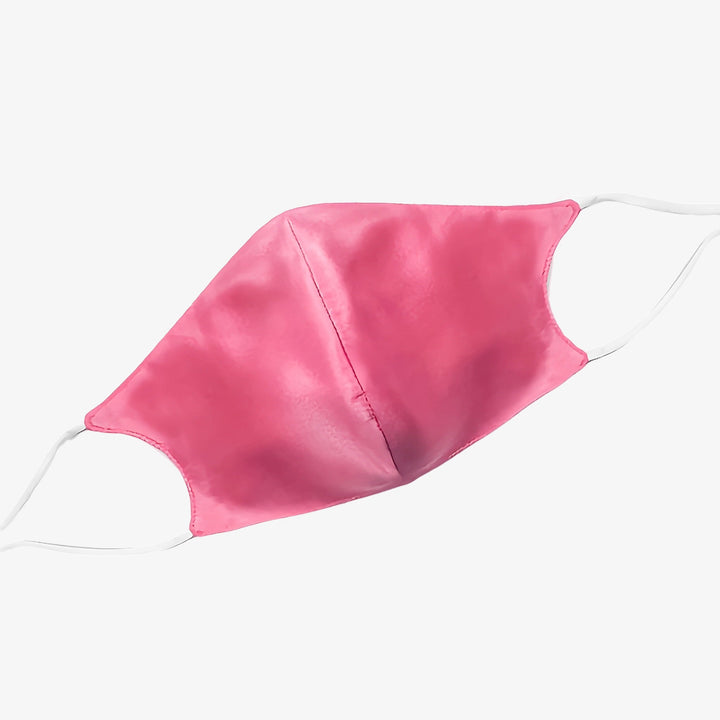 A pink Double Layer Silk Face Mask with Nose Wire, featuring white ear loops and part of the exclusive SusanSilk collection, displayed against a white background.