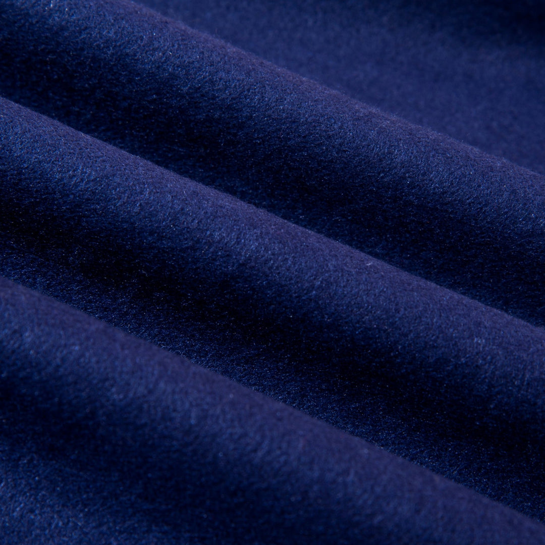 Close-up of SusanSilk's Geometric Pattern Long Silk Brushed Scarf in Blue, showcasing a smooth, soft texture with gentle folds.