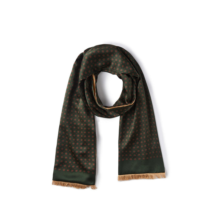 The Geometric Pattern Long Silk Brushed Scarf - Green from SusanSilk, featuring a subtle red and gold geometric pattern, fringed ends, and an intricate design, is displayed against a plain white background.