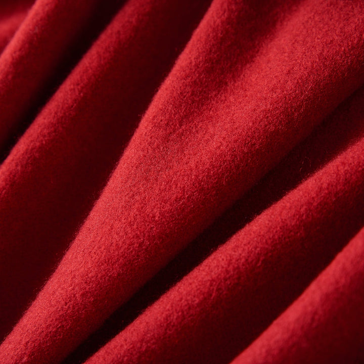 Close-up of the Geometric Pattern Long Silk Brushed Scarf in red by SusanSilk, showcasing its soft, fuzzy texture with delicate folds and shadows.