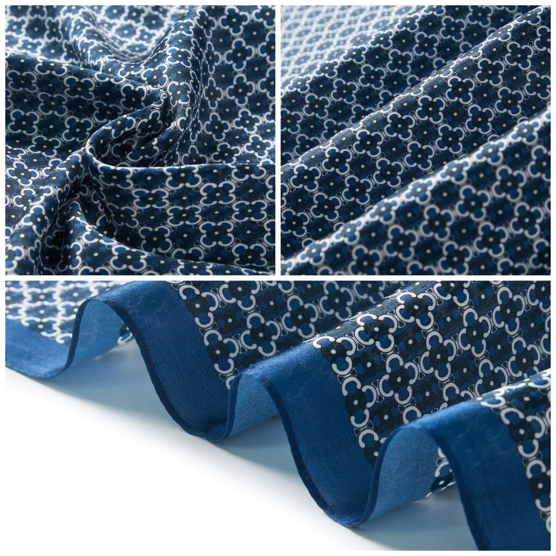 Close-up images of the Lucky Clover Square Silk Scarf by SusanSilk, showcasing its blue and white floral geometric design on a white background.